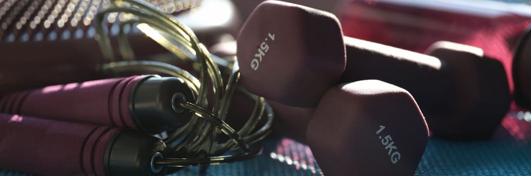 Gym equipment for training at home closeup. Fitness items for training healthy lifestyle concept
