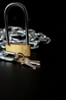 padlock with key and chains in the background isolated on a white background