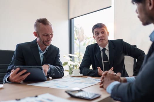 Group of Business financial with finance reports to analyze big data, balance sheet, strategy at meeting room