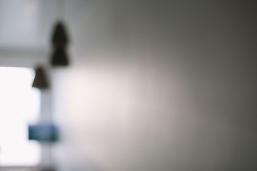 Blurred view of the room with window. abstract blurry background for texture. copy space background interior