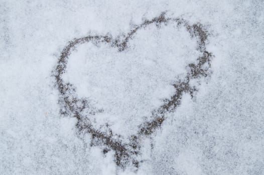 Heart pattern on fresh snow texture background, Valentine's day, Christmas.