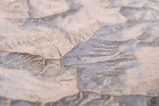 Close up of vintage map, detail of Mt. Everest topographical map showing contour lines, elevation, shallow depth of field. High quality photo
