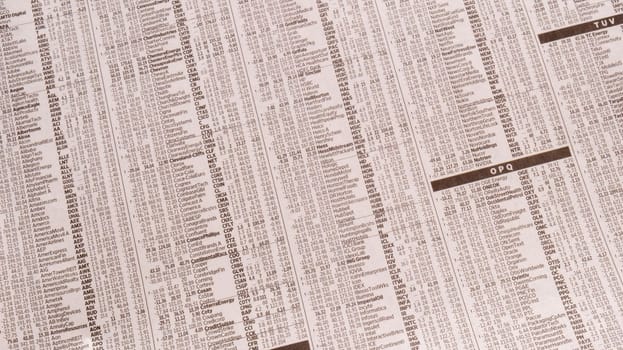 Background of newspaper page showing business stock prices, financial reports, shares. High quality photo