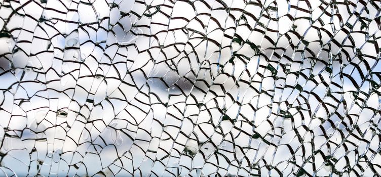 Useful texture overlay. A broken glass on. with many sharp shards. Useful texture overlay for background.