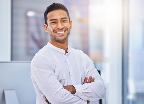 Start noticing what makes you feel happiest and work hard on achieving it. a young businessman standing in a modern office