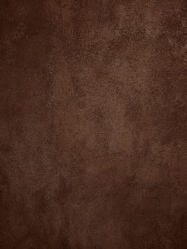 Background texture of uneven dark brown concrete or plaster wall surface