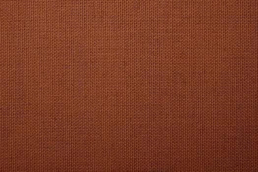 Close up natural brown rough cotton fabric canvas background texture