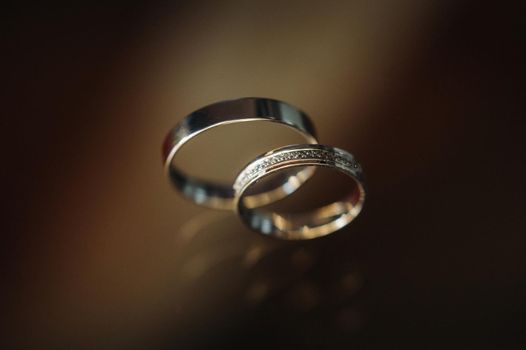 Close-up of two gold wedding rings for a wedding.