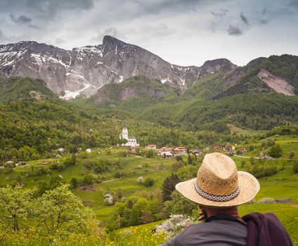 Man looking the Krn mountain in Slovenia