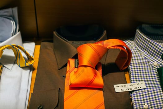 Close up of male shirts exposed in the clothes shop