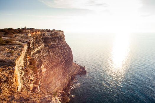 View of the scenic cliff coast of Lampedusa, Sicily