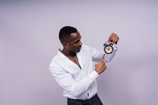 African American millennial businessman isolated on a studio background, successful male formal suit