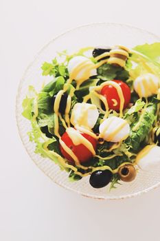 Food and diet, salad with fresh vegetables and mozzarella cheese as meal for lunch or dinner, tasty recipe idea