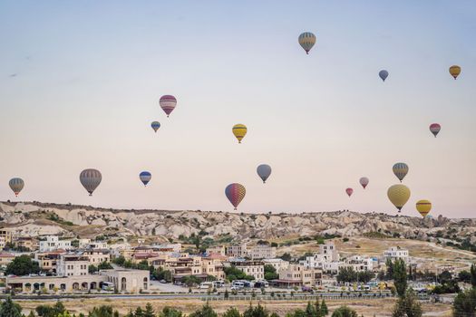 Colorful hot air balloon flying over Cappadocia, Turkey.