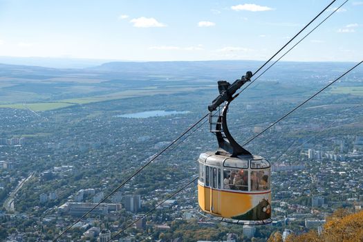 Pyatigorsk, Stavropol Territory - October 12, 2022. Cable car with tourists on Mount Mashuk.