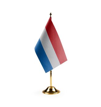 Small national flag of the Netherlands on a white background.