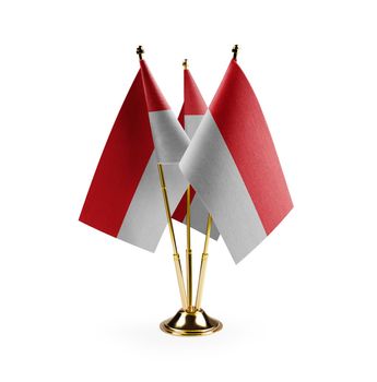 Small national flags of the Indonesia on a white background.