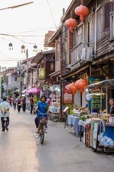 Chiang Khan village North Eastern Thailand February 2023 , A traditional village with wooden house in the evening at the walking street market of Chiang Khan