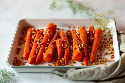 Lebanese-style carrots prepared with pine nuts and cumin, side view
