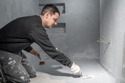 waterproofing of the bathroom floor in a new building.