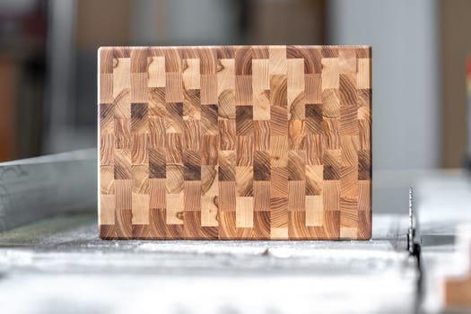 creative wooden board on a sawmill in a carpentry shop. High quality photo