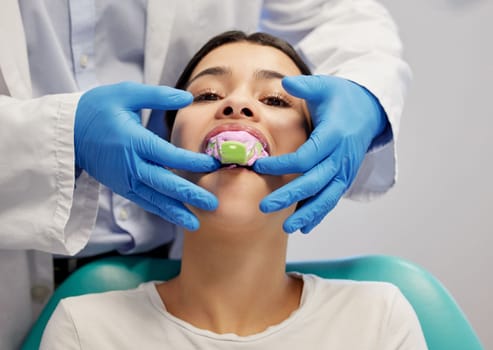 First impressions count. a young woman having dental work done on her teeth