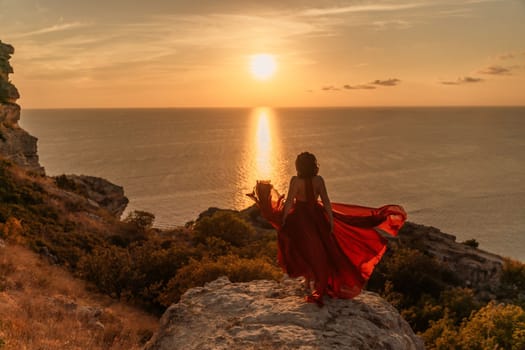 Woman in red dress, fashion model in evening dress, soaring in the street, sunset.