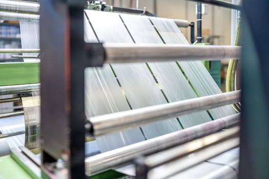 production of plastic bags and packaging on machines in the factory.