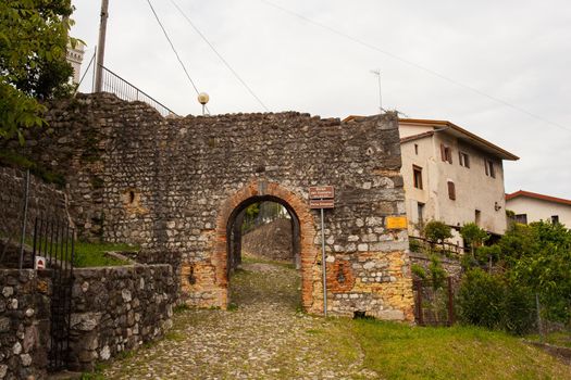 View of the Castle hamlet called synagogue port in Fagagna, Italy