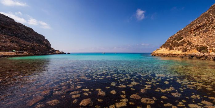 View of Cala Pulcino famous sea place of Lampedusa, Sicily