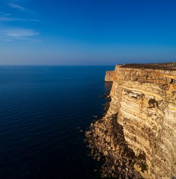 View of the scenic cliff coast of Lampedusa, Sicily