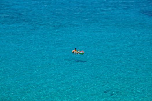 LAMPEDUSA, ITALY - AUGUST, 03: View of the most famous sea place of Lampedusa, It is named Spiaggia dei conigli, in English language Rabbits Beach or Conigli island on August 03, 2018