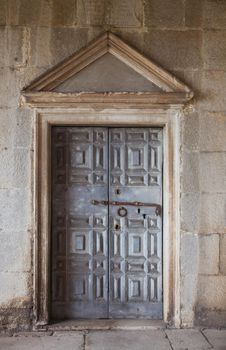 View of a door of a church in Labin, Istria. Croatia