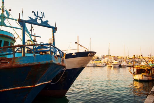 Old fishing boat docked in the Lampedusa port