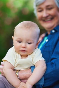 Thank heaven for little boys. a baby boy with his family outdoors