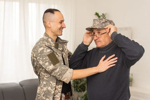 an elderly father and a military son.