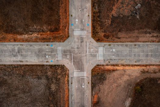 Aerial view of empty intercity road. top view from drone of highway searching paths and lines.