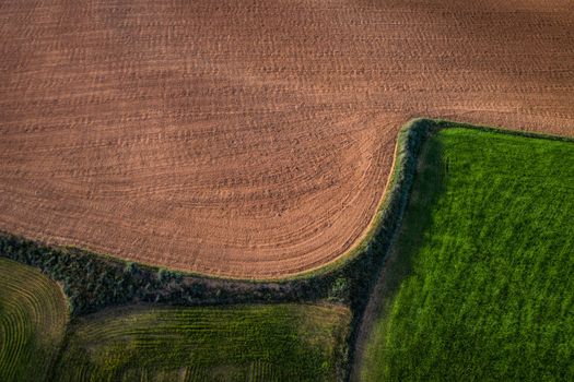 Aerial view of landfields. top view from drone of highway searching paths and lines.