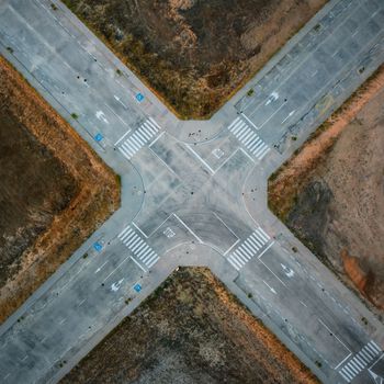 Aerial view of empty intercity road. top view from drone of highway searching paths and lines.