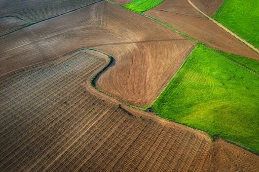 Aerial view of landfields. top view from drone of highway searching paths and lines.