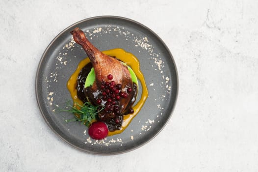 Tasty duck breast with orange and berries