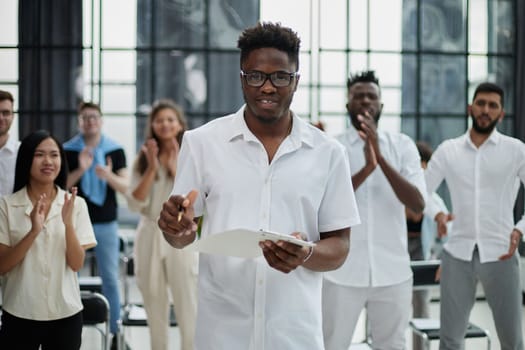 Happy business people applauding a good presentation