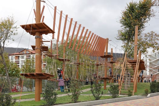 An obstacle course for children and teenagers in an adventure park.
