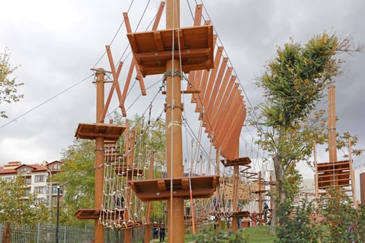 An obstacle course for children and teenagers in an adventure park.