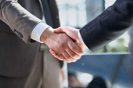 Business handshake and business people