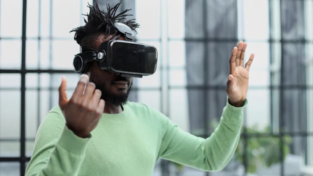 A man is looking for bright impressions using gadgets.