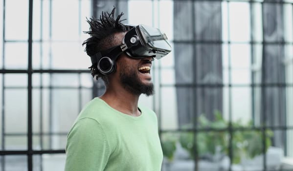 A man is looking for bright impressions using gadgets.
