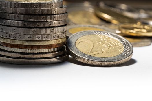 Two euro coin face up. Stack of the coins, close up. Soft focus