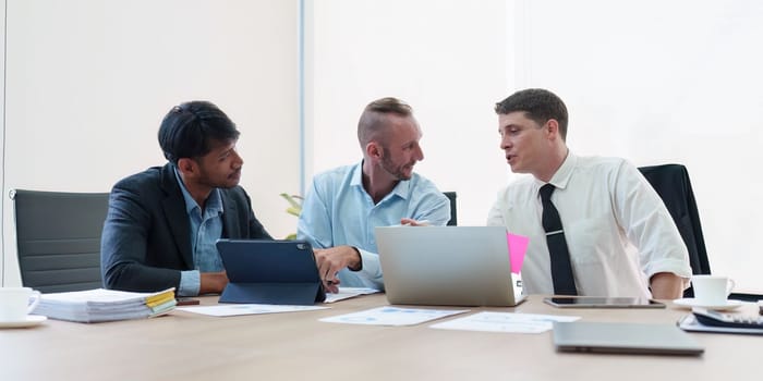 Group of Business financial with finance reports to analyze big data, balance sheet, strategy at meeting room