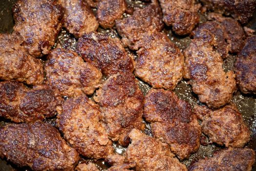 Grilled meatballs in a pan, traditional Turkish food concept